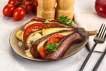 Baked tomato with mozzarella and tomato