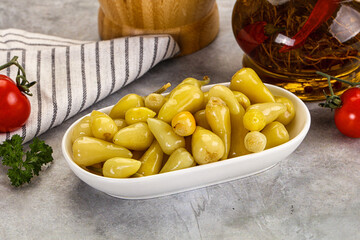 Turkish traditional marinated mini chili peppers