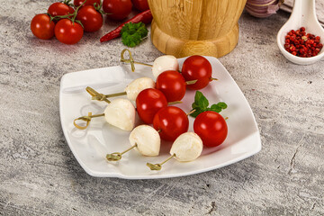 Mozzarella with cherry tomato canape