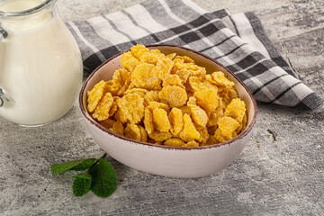 Corn flakes with milk for breakfast