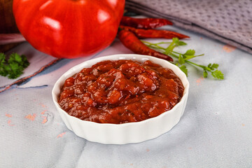 Salsa dip with chili and tomato