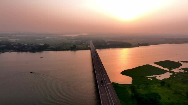 Aerial Sunset View of a Scenic Bridge Over a Serene River Daudkandi Bridge Cumilla Bangladesh