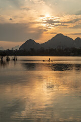 Celestial Dawn on Li River: Golden Mist Rising Between Emerald Karst Peaks – Guilin's Living Watercolor Masterpiece