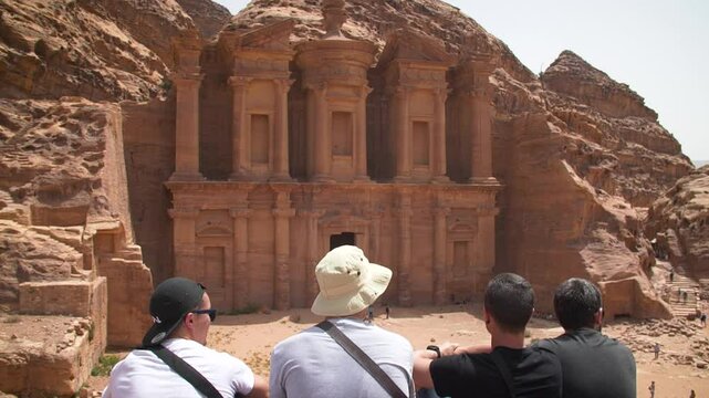 Friends looking at Petra's monastery im Petra, Jordan. High quality FullHD footage