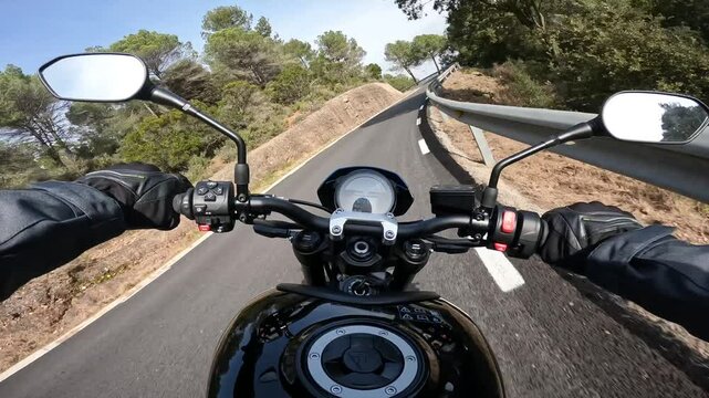Riding a motorcycle POV through catalonia countryside roads. High quality 4k footage
