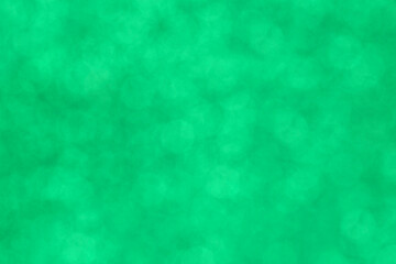 spring backdrop: close up of green bokeh texture