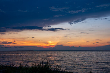 Vibrant Sunset Over Tranquil sea Waters