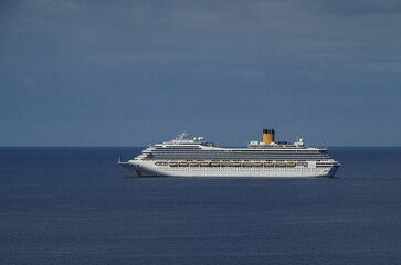 Mega family cruiseship cruise ship liners Favolosa and Fortuna anchored offshore of Civitavecchia...