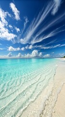 Fototapeta premium Tranquil Tropical Beach with Clear Blue Waters