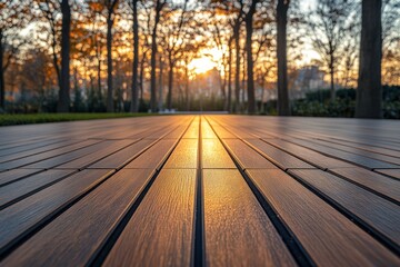 Fototapeta premium Golden sunlight streams through a park path