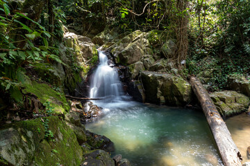 Obraz premium Ulu Kionsom Waterfall located in Sabah, Malaysia. Nature concept
