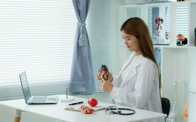 A female doctor who advises patients on heart health, disease prevention, and treatment, including...