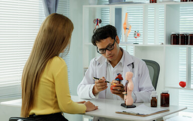 A female doctor who advises patients on heart health, disease prevention, and treatment, including...