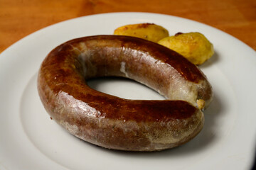 Pan Fried Leberwurst Liver Sausage with Roast Potatoes, a Typical Dish from Bavaria and Austria