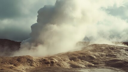 a large plume of steam rises from a hot spring