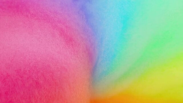 Vibrant, swirling colors of pink, purple, blue, green, and orange create a dynamic, abstract pattern of color gradients