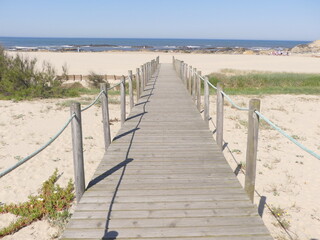 Obraz premium Passerelle en bois plage mer