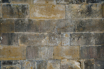 Weathered stone wall, rich texture of the regularly shaped stones 2