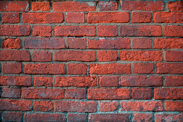 Traditional red brick wall, displaying a weathered and textured surface 5