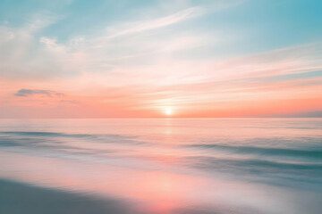 Sunrise over the ocean with pastel colored skies