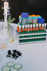 Team Asian scientists in a lab conducting food research using a microscope and lab equipment, showcasing innovation in food science and biotechnology