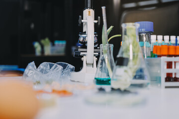 Team Asian scientists in a lab conducting food research using a microscope and lab equipment, showcasing innovation in food science and biotechnology