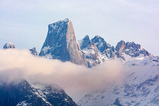 The majestic Naranjo de Bulnes amidst the fog and snow