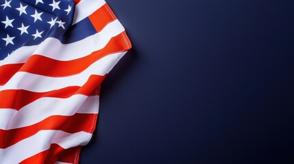 Obraz premium American flag draped against a dark background.
