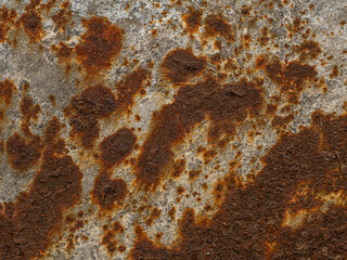 Close-up of rusty metal surface with rich texture and natural corrosion patterns. Ideal for backgrounds, industrial themes, grunge design, and abstract artistic compositions