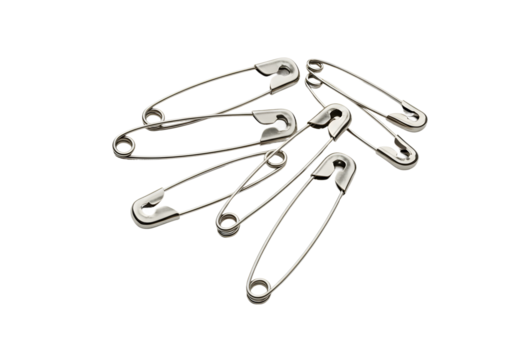Metal safety pins in classic design, grouped and isolated on pure white background