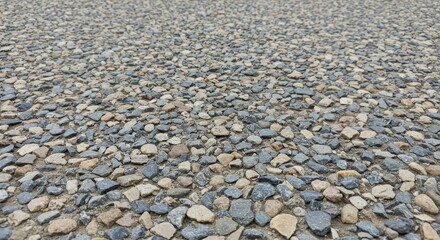 A close up of small gravel making a textured surface