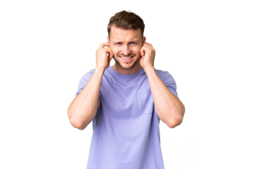 Young handsome caucasian man over isolated chroma key background frustrated and covering ears