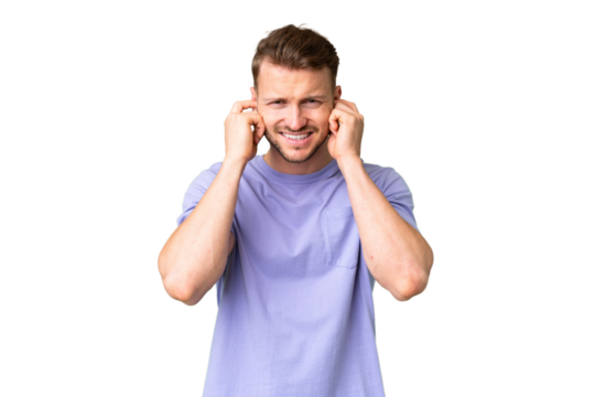 Young handsome caucasian man over isolated chroma key background frustrated and covering ears