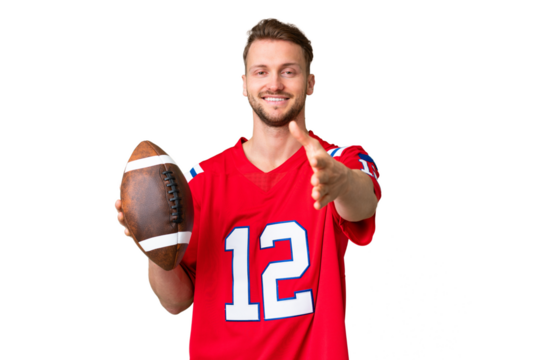 Young caucasian man playing rugby over isolated chroma key background shaking hands for closing a good deal