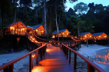 Lush landscape featuring wooden villas lit up on a shore with a long path