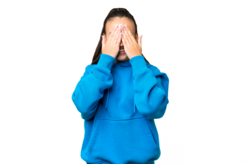 Young Arabian woman over isolated chroma key background covering eyes by hands