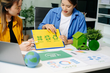 Business team people planning hand using laptop for working technology and business Net zero