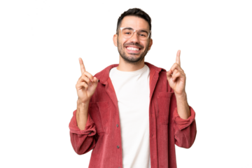 Young handsome caucasian man over isolated chroma key background pointing up a great idea