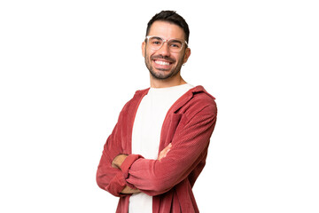 Young handsome caucasian man over isolated chroma key background with arms crossed and looking forward