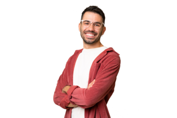 Young handsome caucasian man over isolated chroma key background with arms crossed and looking forward