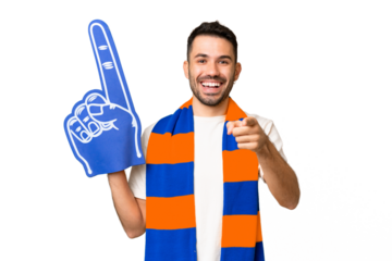 Young caucasian sports fan man over isolated chroma key background surprised and pointing front
