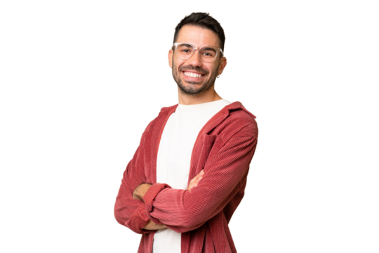 Young handsome caucasian man over isolated chroma key background with arms crossed and looking forward