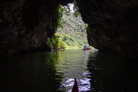 kayaking on the river in ninh bihn, vietnam 