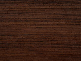 Rosewood veneer surface with rich, dark streaks and elegant wood patterns