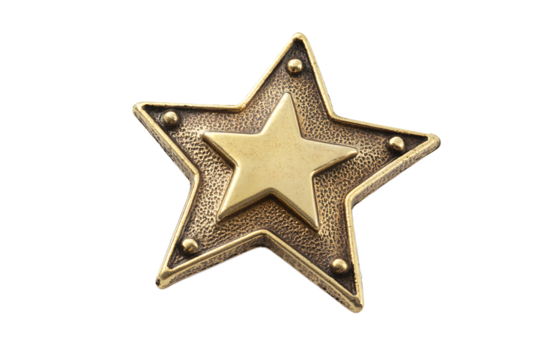 Close up view of a golden star shaped object with a smaller star inside on a black background