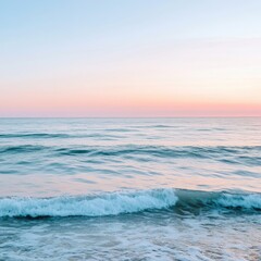 Obraz premium Peaceful coastal scene showing a beautiful sunrise over the ocean