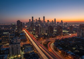 Fototapeta premium Aerial View of City Skyline at Dusk