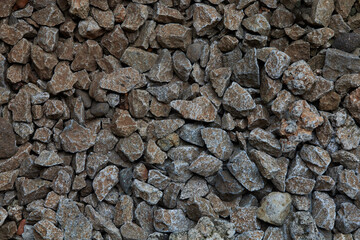 Close up Texture of Rough Stone Gravel in Natural Color Variations Showing Details and Patterns