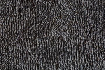Close up Macro Shot of Intricate Texture on Dark Fabric Surface With Fine Fibers and Patterns