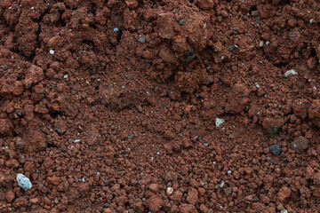 Close up Macro Shot Highlighting Rich Texture of Soil With Minerals and Small Stones in a Natural Setting